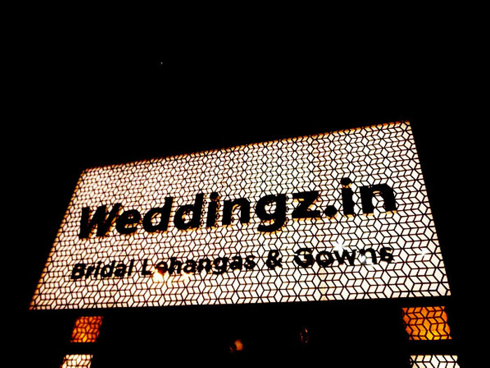 WEDDINGZ.IN BUILDING FRONT CLADING WITH STEEL AND SS LETTERS SIGNAGE