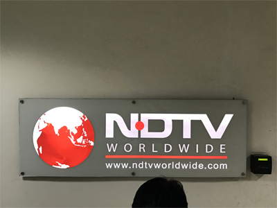 NDTV TV OFFICE ENTRANCE RECEPTION UV BLOCKOUT SIGNAGE IN WELDON PARK 